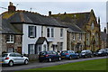Houses and former chapel beside the green at St Helens in PO33 1UW