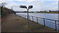 Cycleway signpost next to Infinity Bridge which spans the River Tees in TS18 2LL