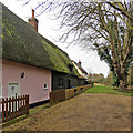 Kneesworth: plaster, weatherboarding and mossy thatch in SG8 5FL