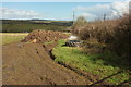 Manure heap and tyre, Langford Gate in TQ10 9HA