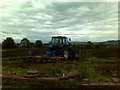 Tractor in a field in DG1 4XZ