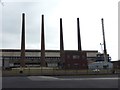 Chimneys at the Tata steelworks in S65 3SR