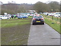 Vehicles leaving the car park field in WS15 1LB