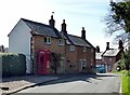 Main Street Keyham, with telephone kiosk and The Old Post House in LE7 9JU