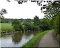 Towpath along the Leeds and Liverpool Canal in BD16 3JJ