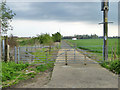 Double gated road off Harmondsworth Lane in UB7 0DL