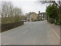 Shelf Hall Lane at its junction with Cock Hill Lane in HX3 7JT