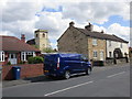 Houses in Common Road and St. Helen's church in S63 0RW