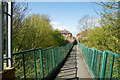 Footbridge over old railway cutting in DH6 2QE
