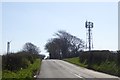 Communications mast and wind turbine by A395 in PL15 8PF