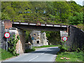 Road passing beneath railway bridge in PH16 5TD