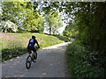 Cyclist on byway, Cherhill in SN11 8XN