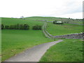 Footpath to Kirkby Stephen railway station west of Halfpenny House in CA17 4SF