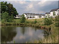 New houses and lochan in G75 8WH
