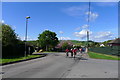 Cyclists leaving Dingwall on National Cycle Route 1 in IV15 9WS