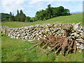 Old tractor implement, Court Hill in DG3 4JY