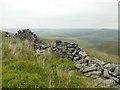 Broken wall on Crookstone Out Moor in S33 7ZH