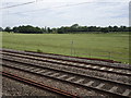 View from a Rugby-Crewe train - Fields near Grendon Bridge in CV9 3DN