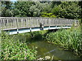 Footbridge from the Millennium Green over the River Ivel in SG18 9SJ