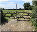 Wooden gates across a field entrance, Eastington in GL10 3AZ