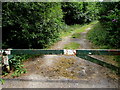 Rusting barrier across an entrance to Deri Forest in CF81 9GW