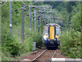 Train approaching Fairlie station in KA29 0DD