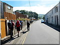 Cerddwyr ar Heol Cwmbach / Walkers on Cwmbach Road in CF44 6TT