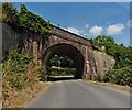 Railway bridge, towering above Whitford Road in EX13 7PB