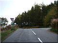 Junction of Anguston road with the A93 in AB14 0NW