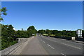 The A803 (Main Street) leaving Linlithgow, and crossing the River Avon in EH49 7TA