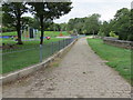 Cobbled pathway and play area in Ball Grove Park in BB8 7BU