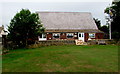South side of Oakridge Village Hall, Oakridge Lynch, Gloucestershire in GL6 7NZ
