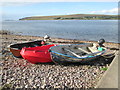 Boats  on  the  stony  beach  Badluarach  jetty in IV23 2RA