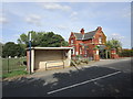 Bus shelter and cemetery lodge, Askern in DN6 0BQ