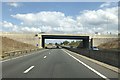 Road across A421 at junction for Marston Moretaine in MK43 0TP