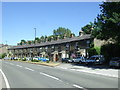 Terraced housing on Hayfield Road, Birch Vale in SK22 1BS