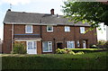 Semi-detached houses at Occupation Road / Eskdale Avenue junction in NN17 1YR