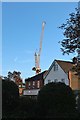 Crane on Between Streets, Cobham in KT11 1AF