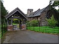Lychgate and Church of St John the Baptist in ST12 9BP