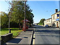 Bus stop and shelter on Market Street (A671) in OL13 9SD