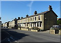 Terraced housing on Rochdale Road (A671) in OL13 9BH
