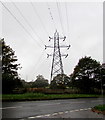 Dominant electricity pylon behind Heol Maes Eglwys, Swansea in SA6 6LS