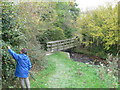 Footbridge over a stream near Henllan in LL16 5AT