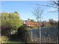 Footbridge over the dismantled railway near Barrow Hill in S43 2NL