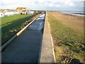 Seawick: Sea defence wall at St Osyth Beach in CO16 8SJ