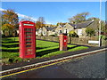 George VI postbox and telephone box on Friarmere Road, Delph in OL3 5HX
