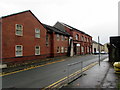 Brick buildings on the east side of Market Street, Morriston, Swansea in SA6 8AA