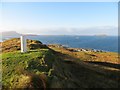 Triangulation pillar on Cnoc Dhomnuill, Luing, 94m in PA34 4UB