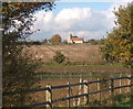 Distant view of Creeting St Mary church in IP6 8NQ