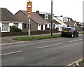 Warning signs alongside Merlin Crescent, Bridgend in CF31 4QN